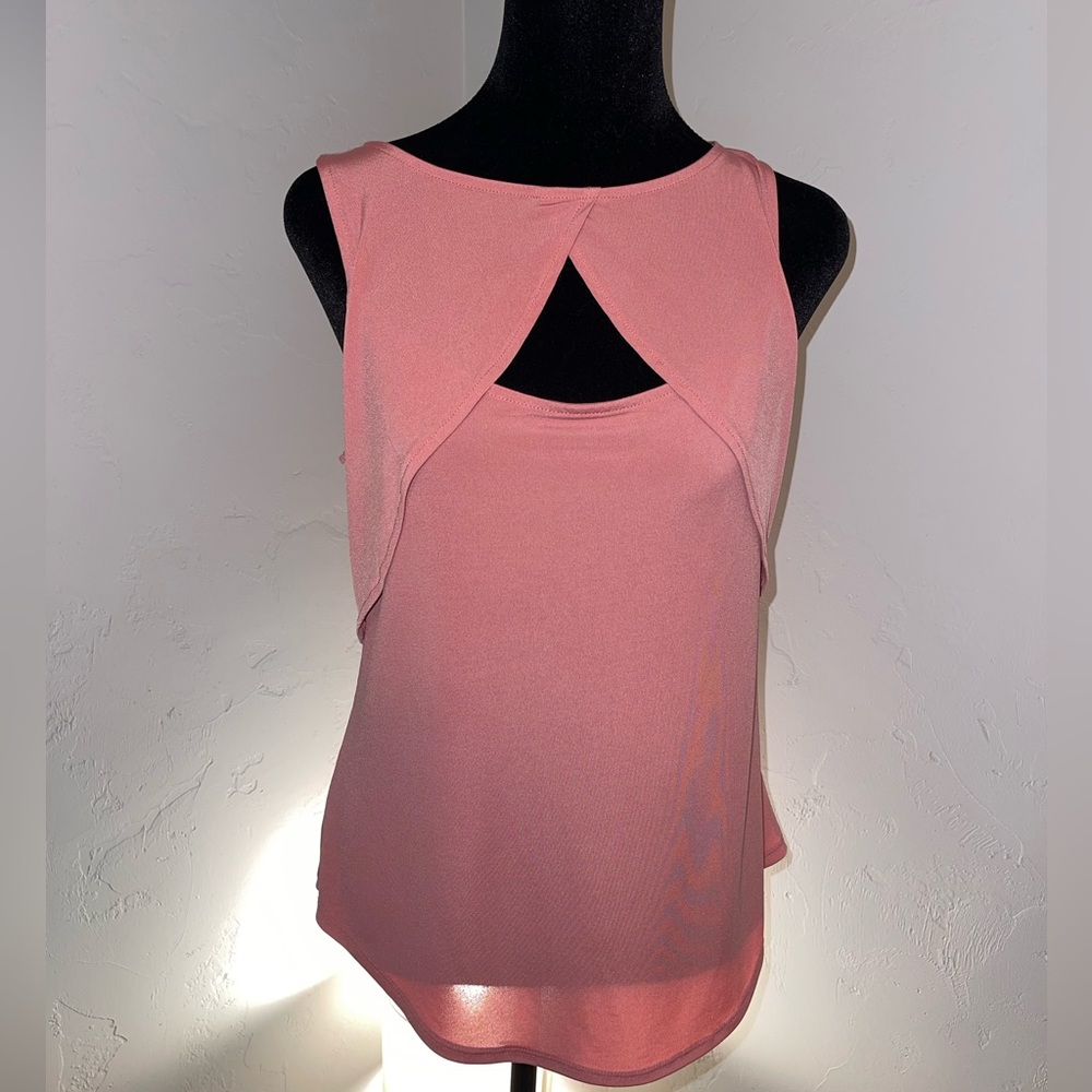Nice pink tank top style  very versatile to wear several different ways